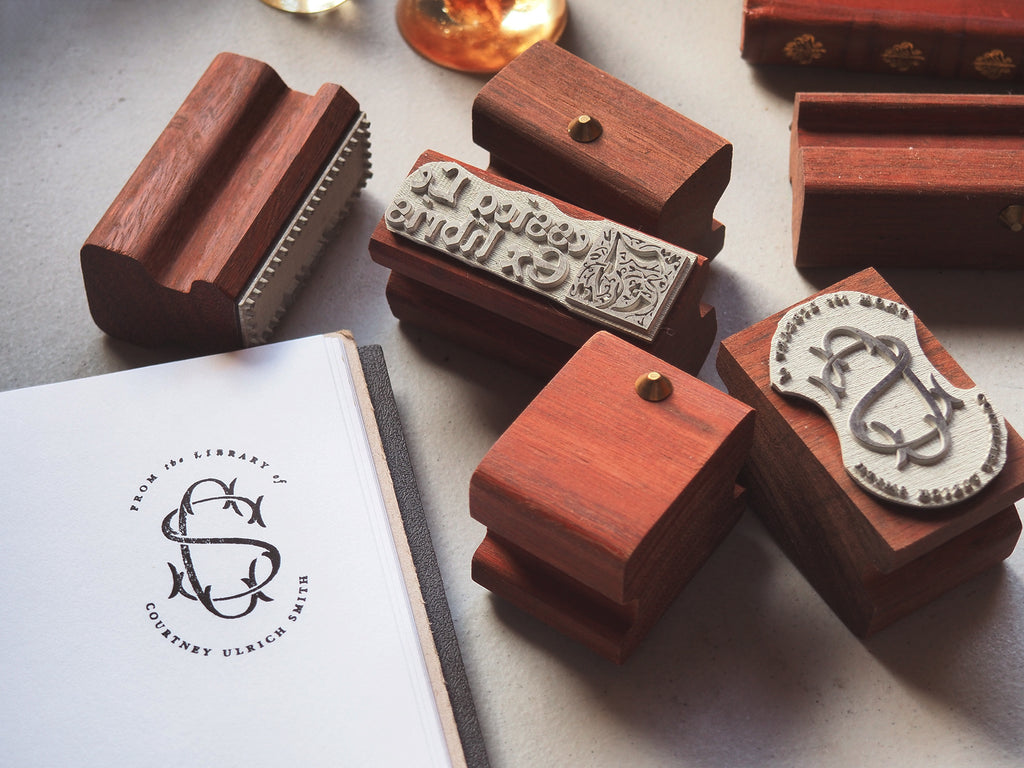 Selection of wooden bookplate book stamps