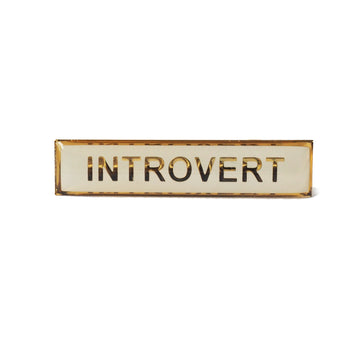 Enamel title badge Introvert in white and gold