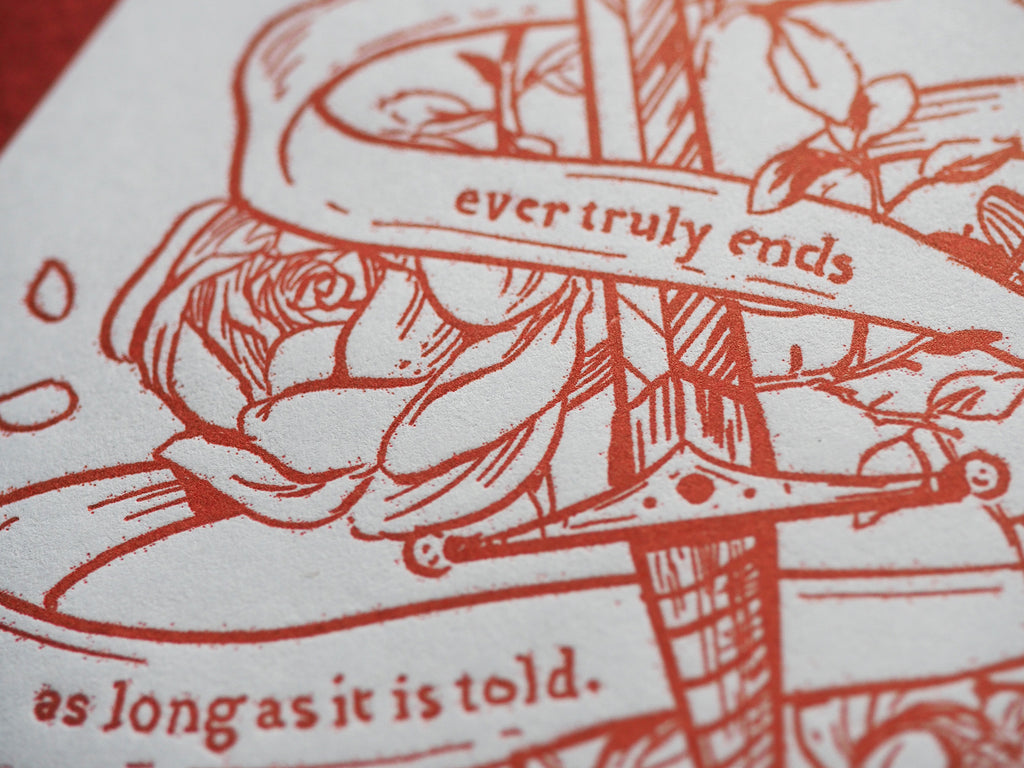 detail view of red letterpress bookplate showing tiny dots