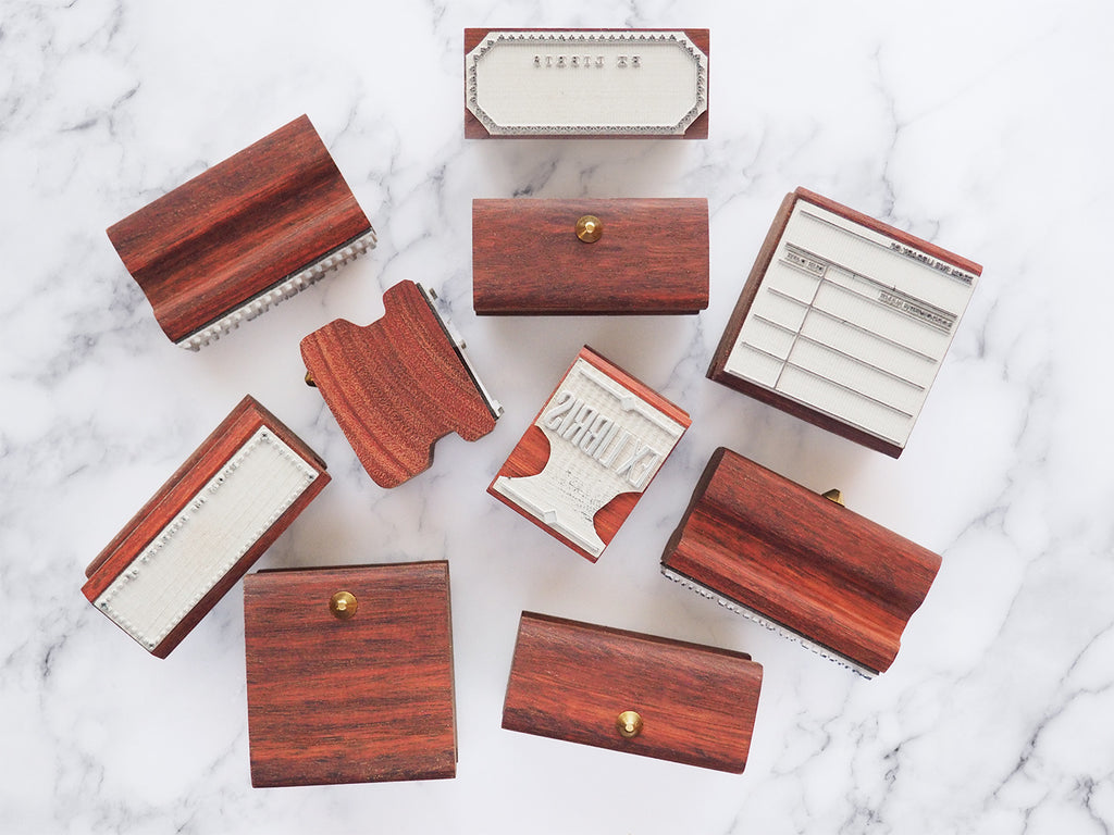 Collection of wooden rubber stamps top view