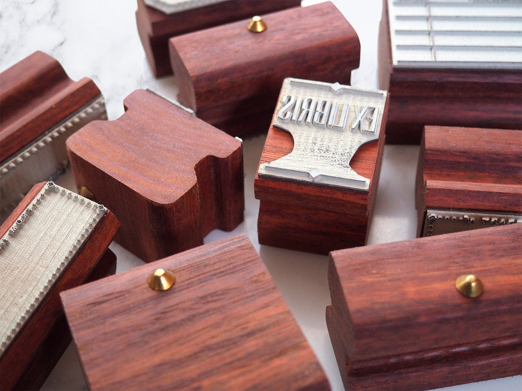 Collection of wooden rubber stamps