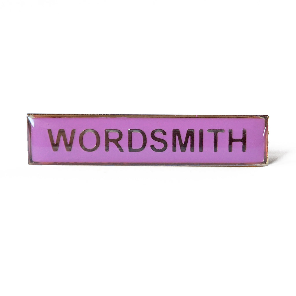 Wordsmith enamel title badge